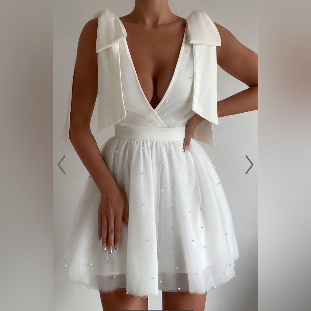 Showpo White Bow Strap Plunge Pearl Mini Dress